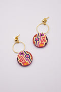 Pair of hand-painted colorful geometric earrings with gold hoops. 